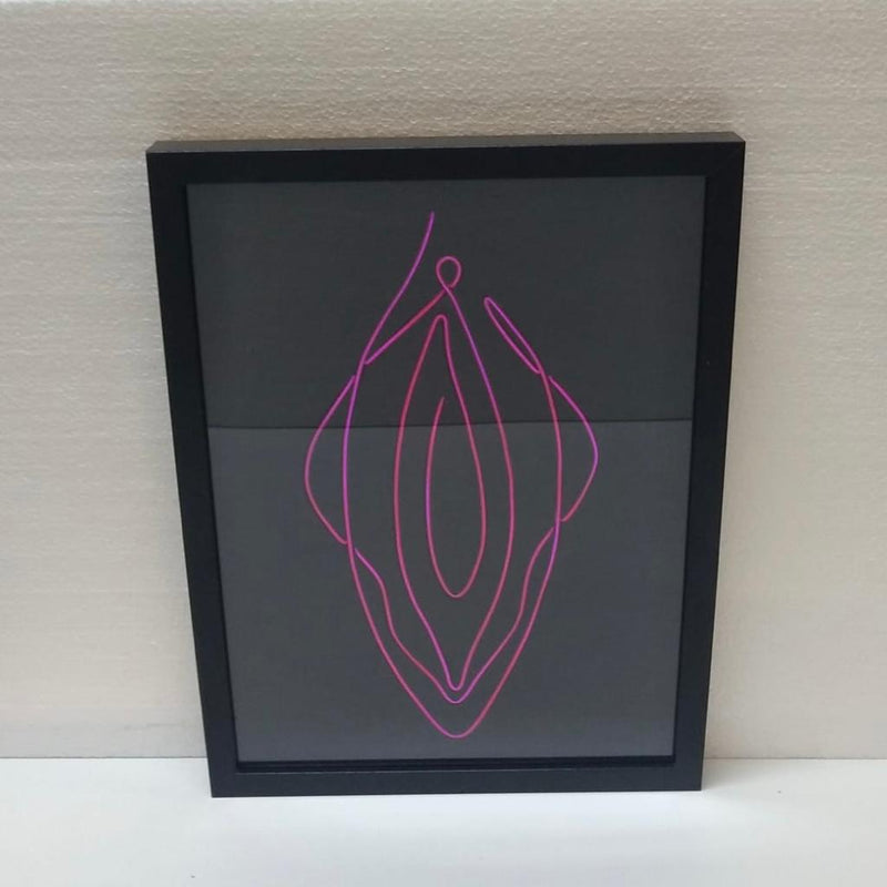 Wandschild mit beleuchtetem Text VAGINA