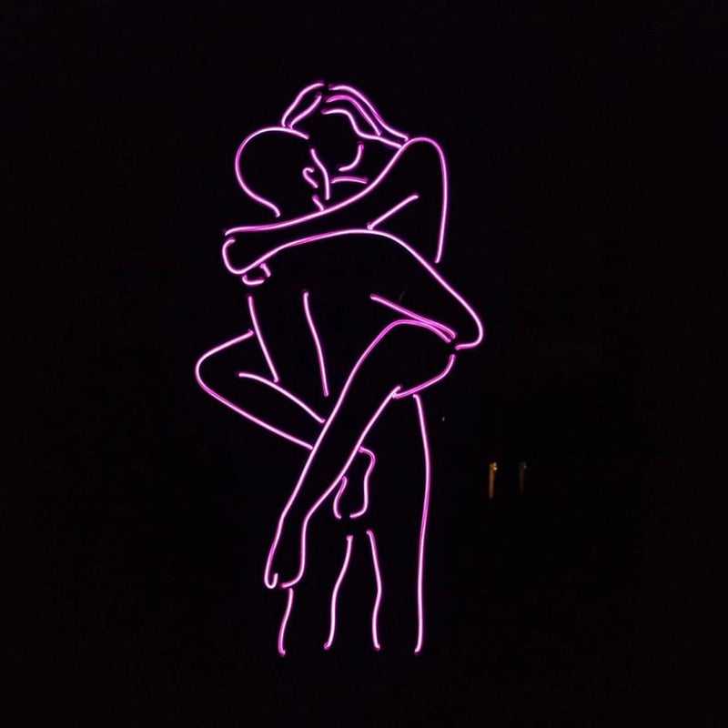 Wandschild mit beleuchtetem Text KAMASUTRA POSITION