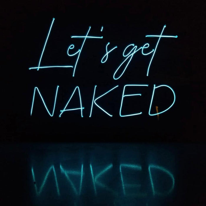 Wall sign with illuminated text LET'S GET NAKED